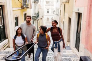 Group of tourists walking down stairs in lisbon, portugal