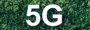 Inscription 5G on moss, green grass background. Top view. Banner. Biophilia concept. Network