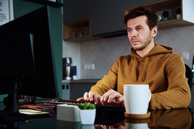 Man working late remotely at home