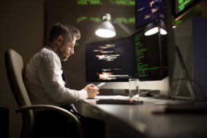 Talented Programmer Working Late